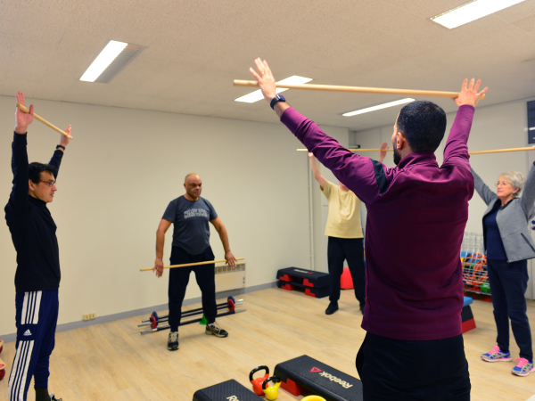 Personnes faisant du taiso, sport en douce